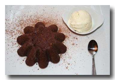 warm chocolate cake with vanilla ice cream