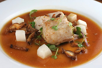 baked wild striped bass with duck broth