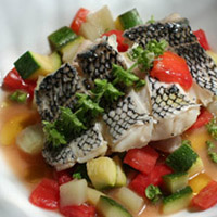 Steamed Black Sea Bass, Diced Zucchini, Fennel and Heirloom Tomatoes with a Basil and Vegetable Nage